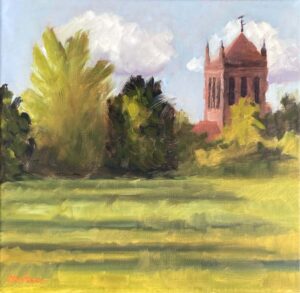 Plein air oil painting of Mossley Hill parish church rising above green trees and a sunlit field at Holt Field Liverpool