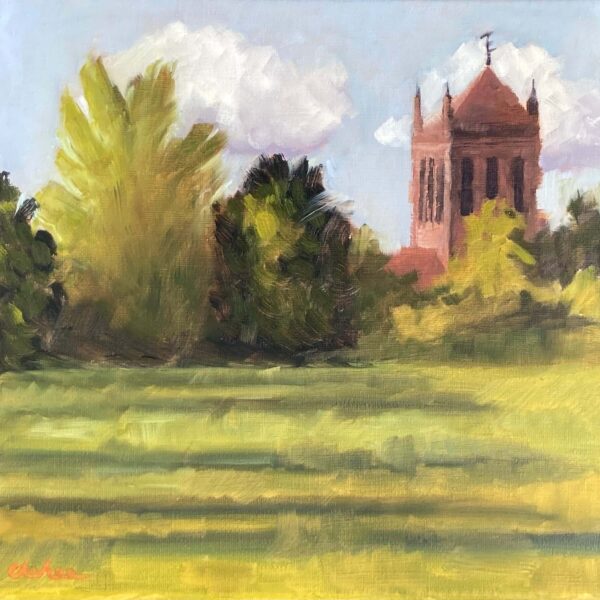 Plein air oil painting of Mossley Hill parish church rising above green trees and a sunlit field at Holt Field Liverpool