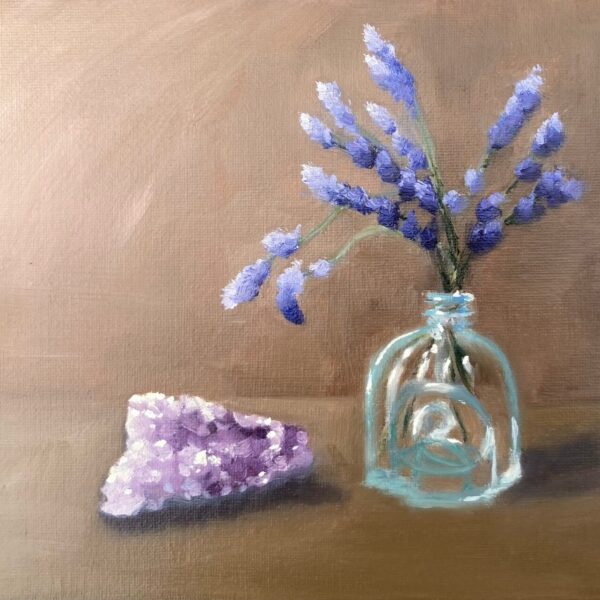 Oil painting of purple lavender sprigs in a small glass bottle beside a rough amethyst crystal, on a warm brown background