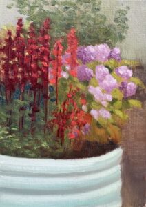 Oil painting of a white planter filled with crimson salvia and lilac hydrangea against a green hedge background.