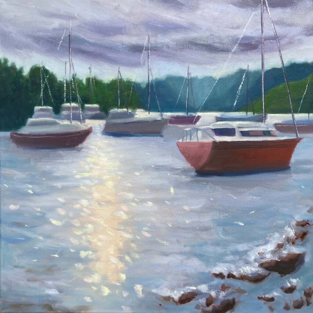 Oil painting of boats moored on Lake Windermere under a cloudy sky, with sunlight breaking through and reflecting brightly across the water.